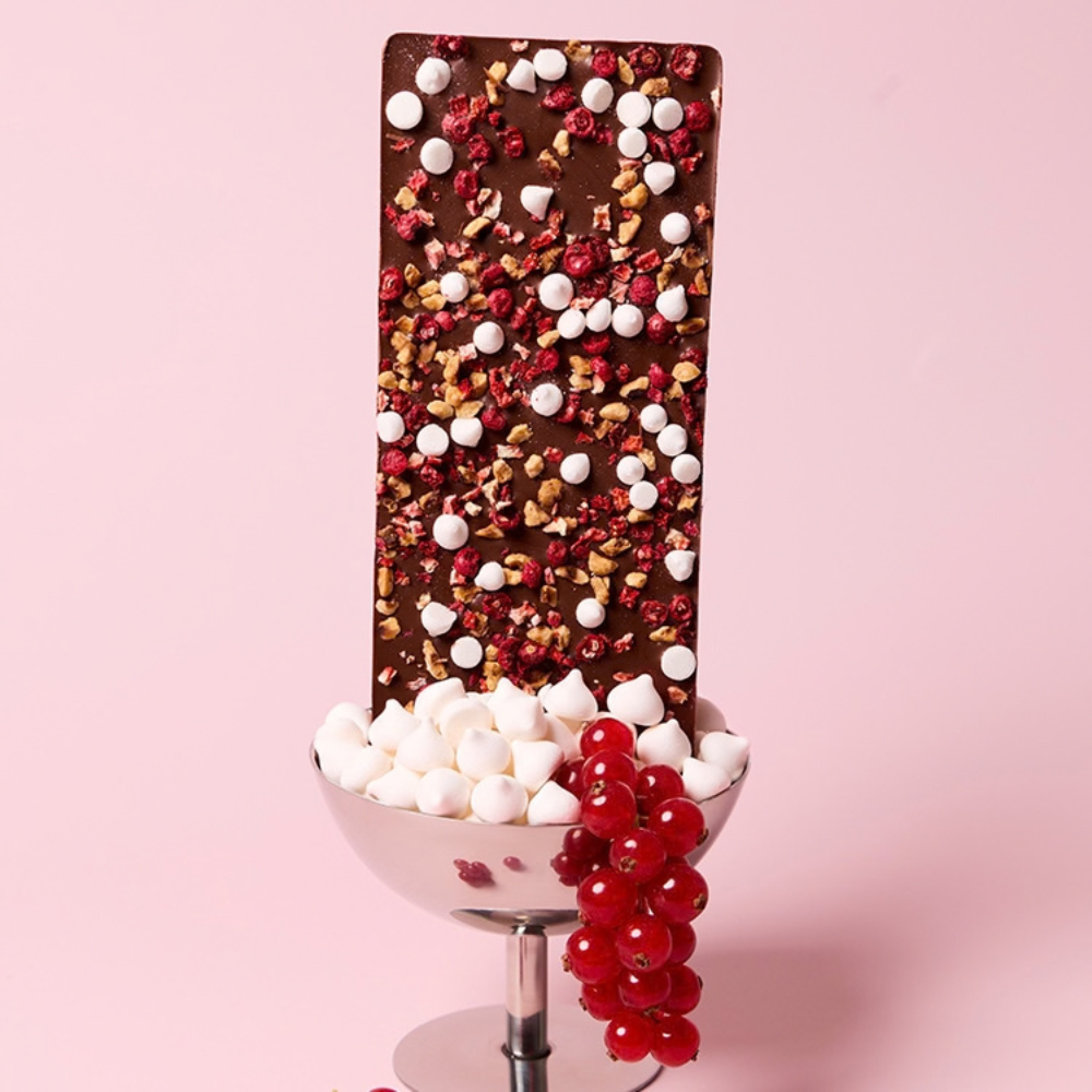 MILK CHOCOLATE BARK WITH RED BERRIES, SNOW PEARLS AND HAZELNUTS